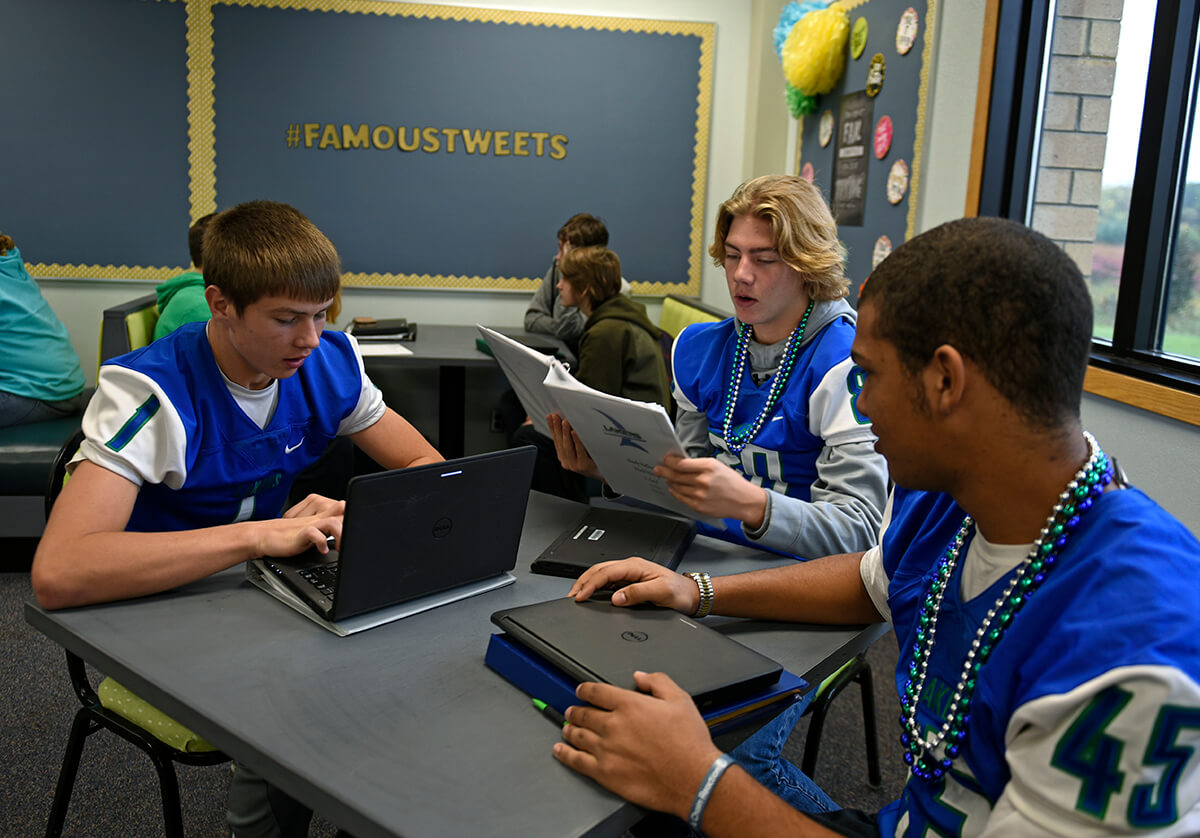 Minnewaska Area High School students studying with computers