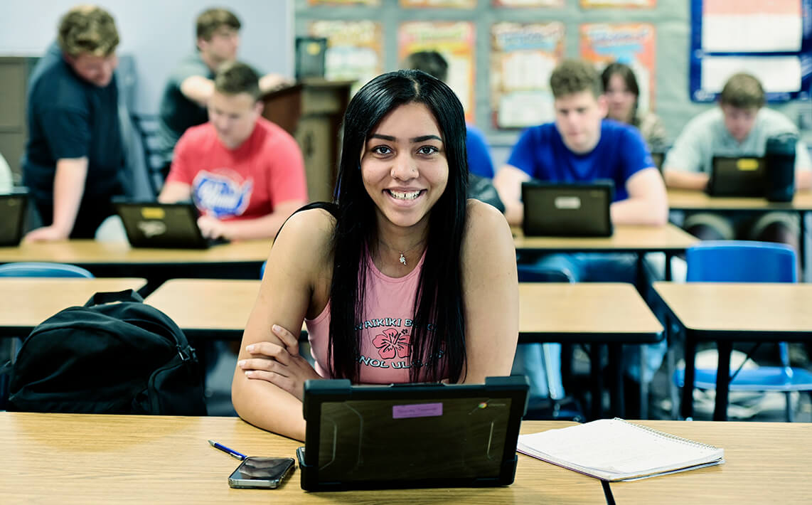 High school student on Chromebook